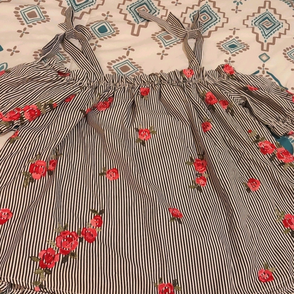 Off the shoulder floral striped blouse . Size L